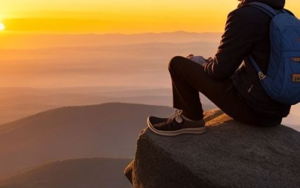 DreamShaper v7 a young man sitting alone at the top of a hill 0